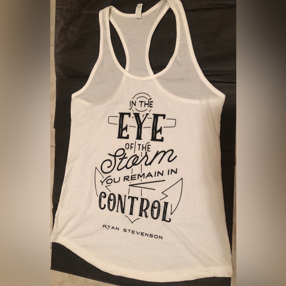 NWOT IDEAL T By Next Level racer back tank. Song Hit “In The Eye Of The Storm”